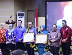 Deputi Bidang KSPK BKKBN RI Kukuhkan Pj Bupati dan Pj Ketua TP PKK Banyuasin Sebagai Ayah dan Bunda Genre Banyuasin
